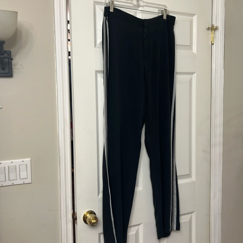 GO Silk black pants with gray and white stripes on sides.  Size large.